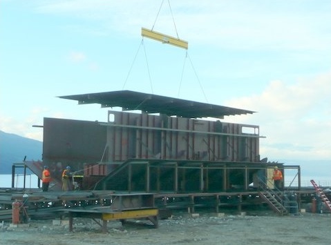 Engineering deck floor being lowered into place.
