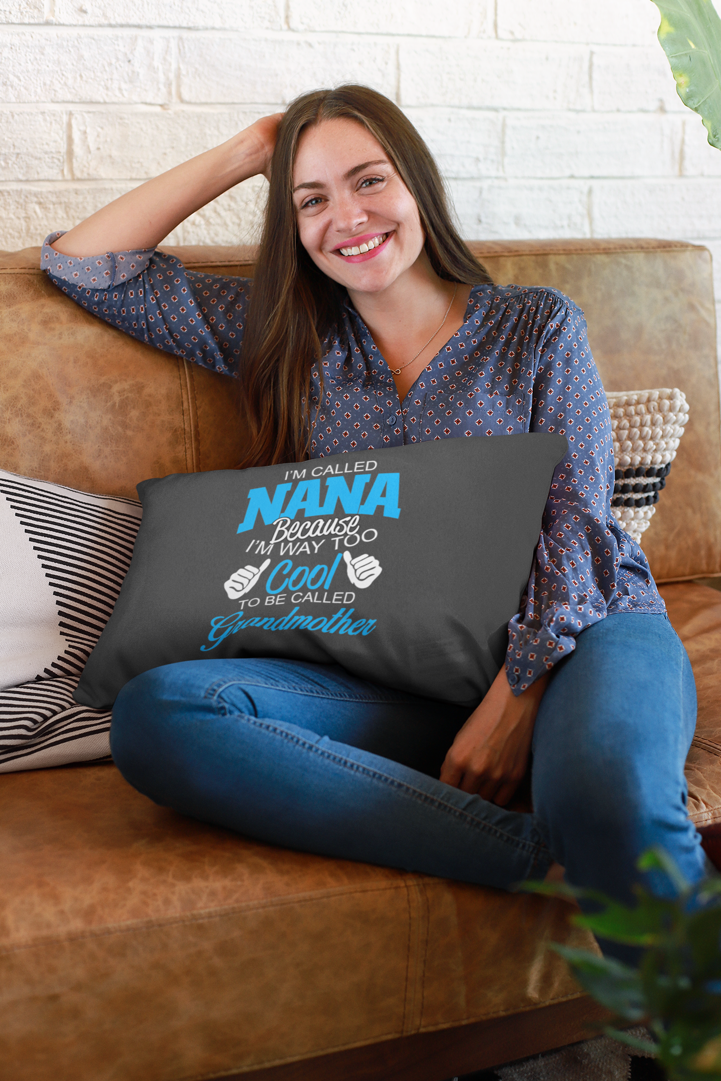 https://0901.nccdn.net/4_2/000/000/038/2d3/pillow-of-a-woman-relaxing-on-a-leather-coach-with-a-pillow-on-h.png