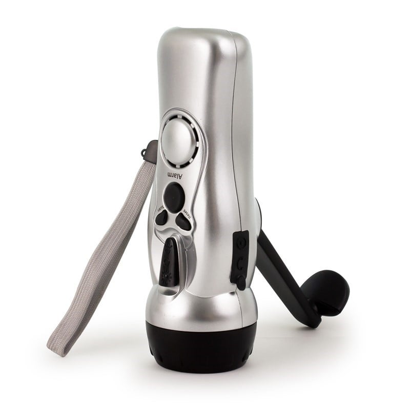 Smiling doctor wearing a stethoscope standing in a pharmacy with shelves stocked with medicines and health products.