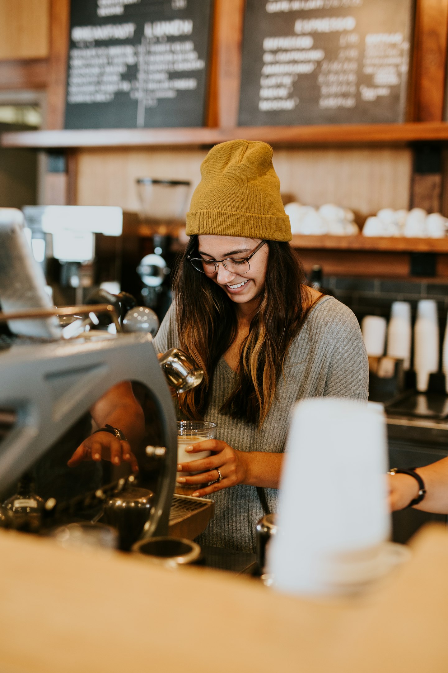 Happy female barista