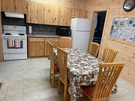 https://0901.nccdn.net/4_2/000/000/038/2d3/wild-north-outfitters-main-cabin-kitchen-2-madawaska-ontario.jpg.jpg