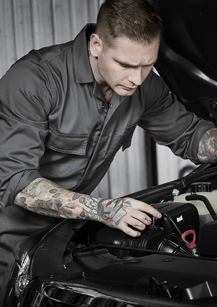 person holding white and red box