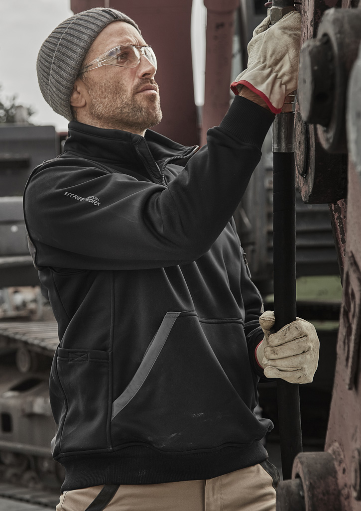 person holding red Supreme label gun