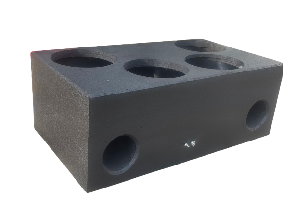 Car audio installation workshop with open door speakers, subwoofer box, amplifiers, wiring, and tools on workbench