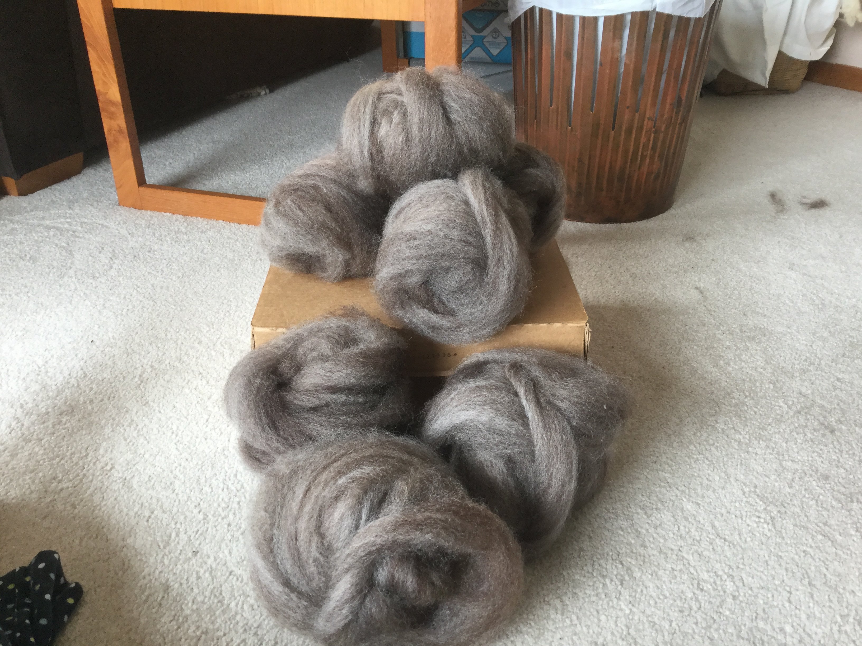 Grace - fibre put through the drum carder tip end first.  The fibre is then dized off to produce a roving.  