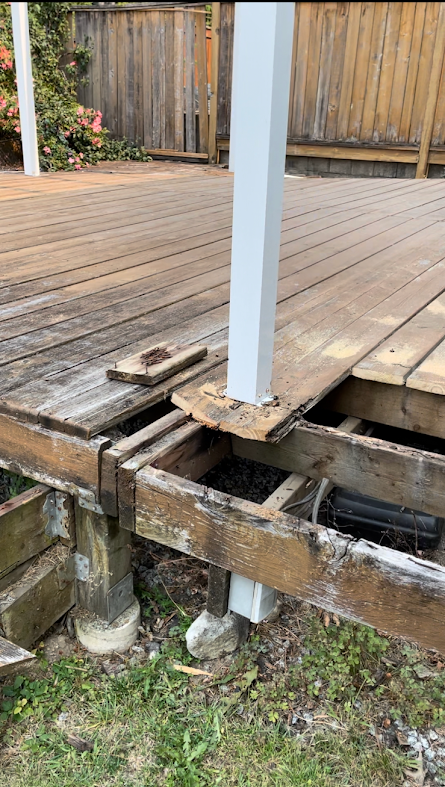 Rotten wood on cedar deck surface can be a safety hazard. 