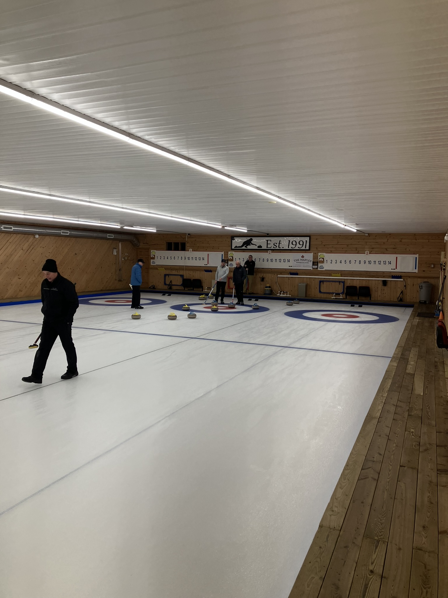 Doug and Teddy deliberating their shot