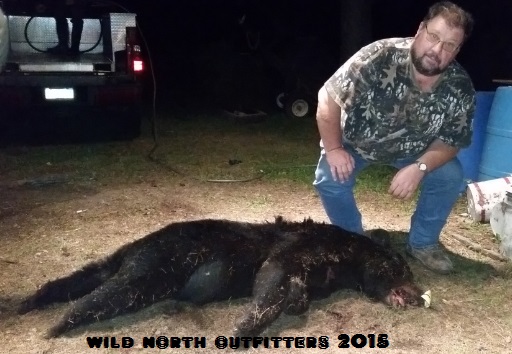 https://0901.nccdn.net/4_2/000/000/046/6ea/2015-hunter-with-black-bear-ontario-don.jpg
