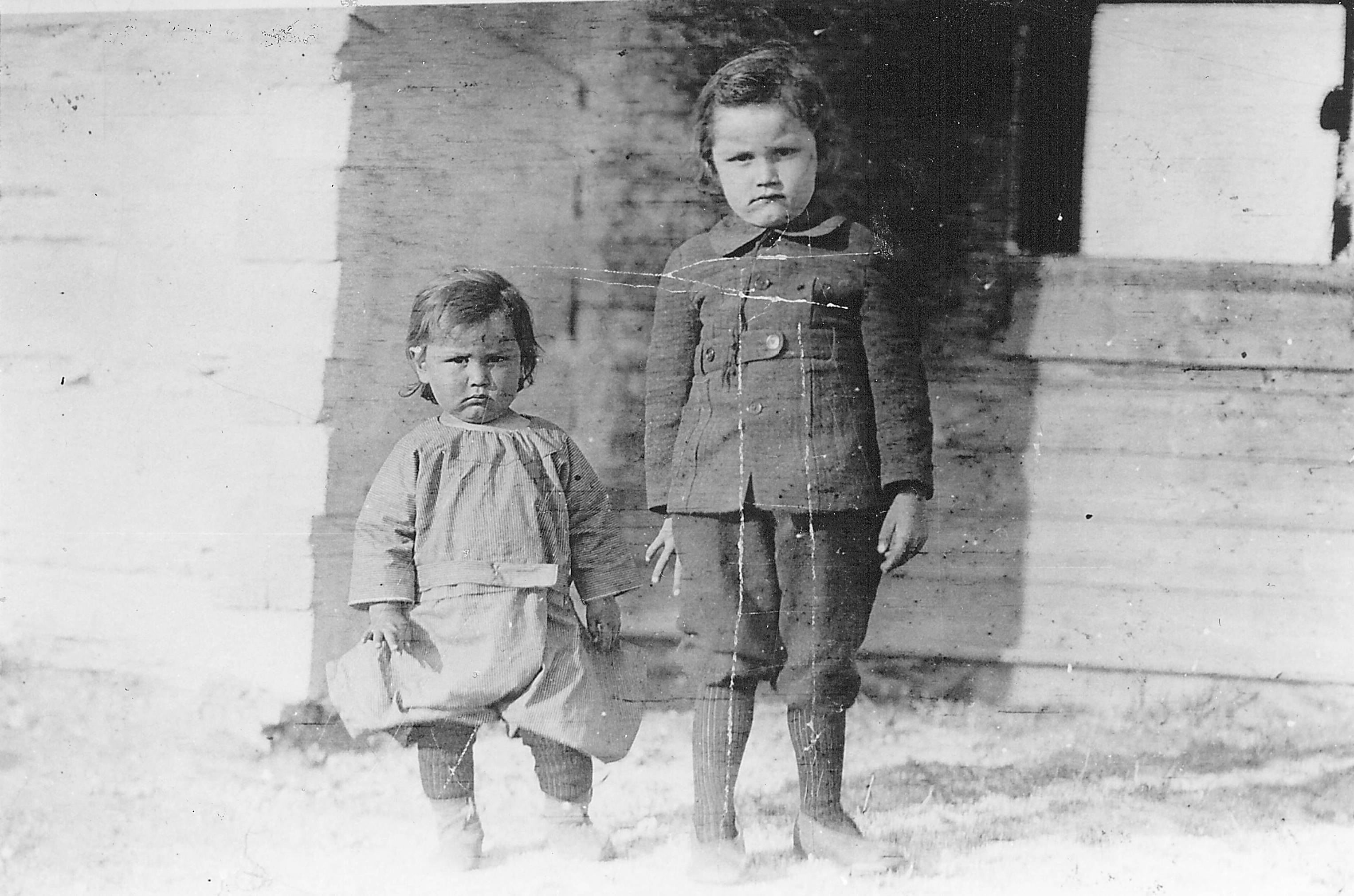 Look at these Cuties! They don't appear to impressed with the photographer and our best guess is they are siblings. Perhaps this is a 'Baby' picture of someone you know! Comment below if you have any leads!
990.4.106.39 / Ward, Vera