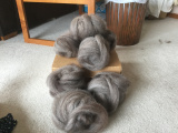 Grace - fibre put through the drum carder tip end first. The fibre is then dized off to produce a roving.