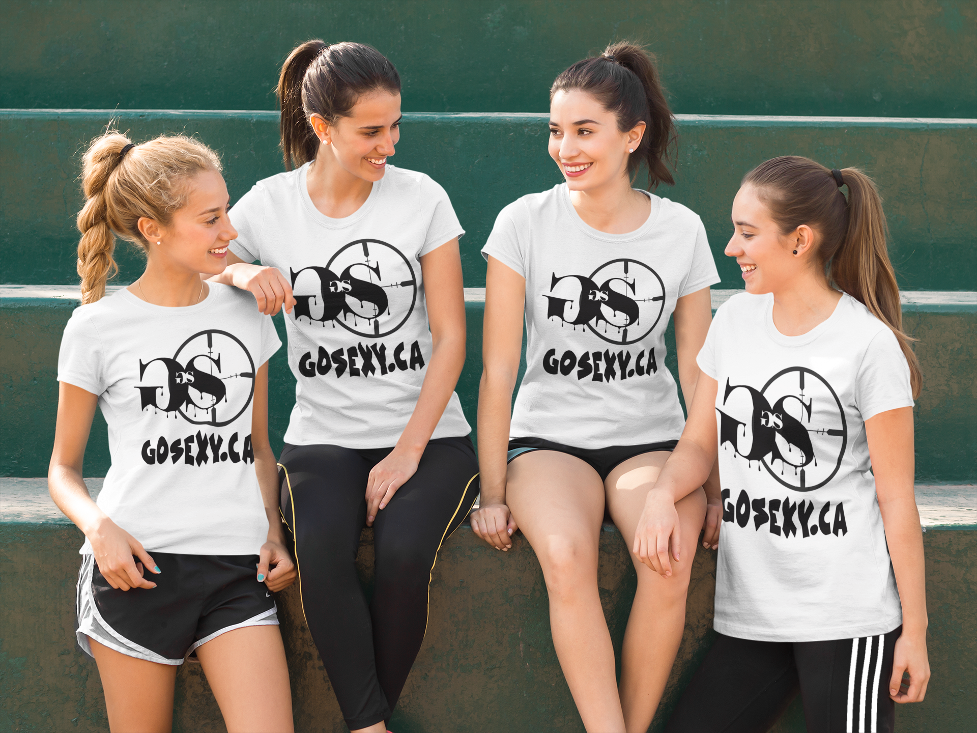 https://0901.nccdn.net/4_2/000/000/046/6ea/group-of-four-girlfriends-wearing-different-tshirts-while-sittin.png