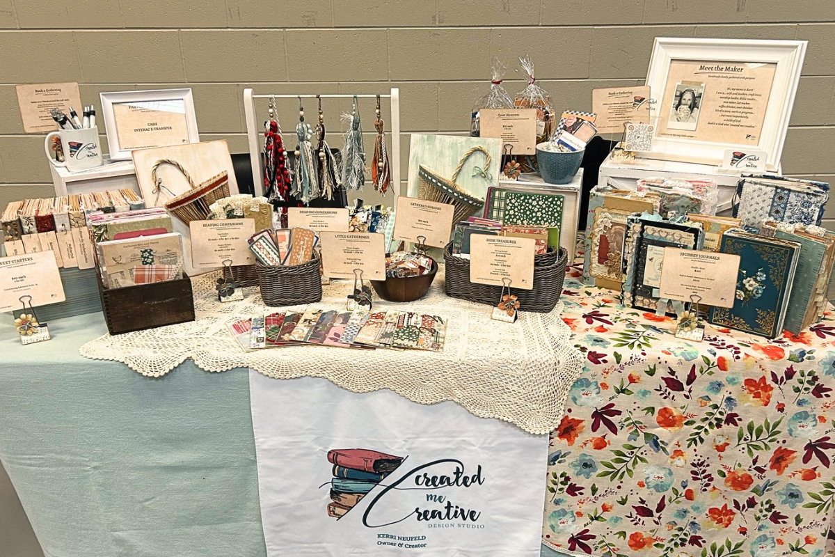 Created Me Creative handmade market display featuring one-of-a-kind Journey Journals, paper crafting treasures, bookmarks, and handcrafted gifts.