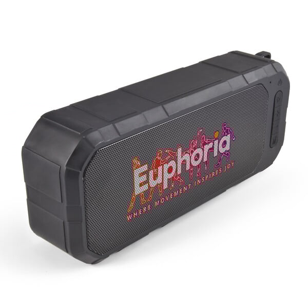 a window with a curtain and a chair in front of it