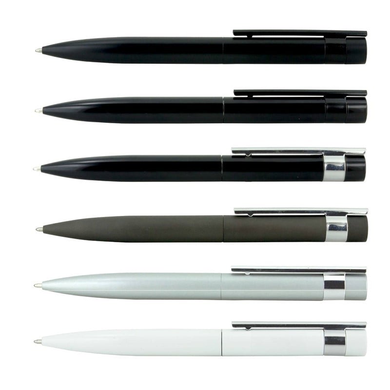 a hat sitting on top of a table next to a vase