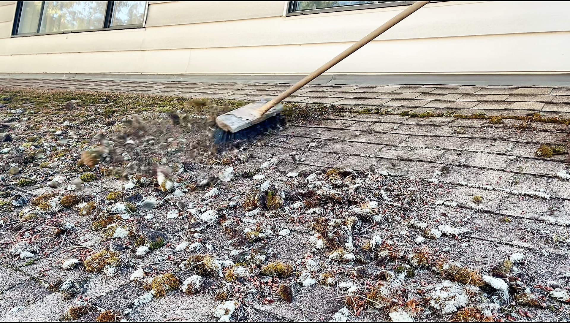 Sweeping Asphalt Roof
