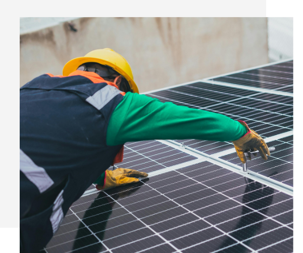 Technician working on solar panel