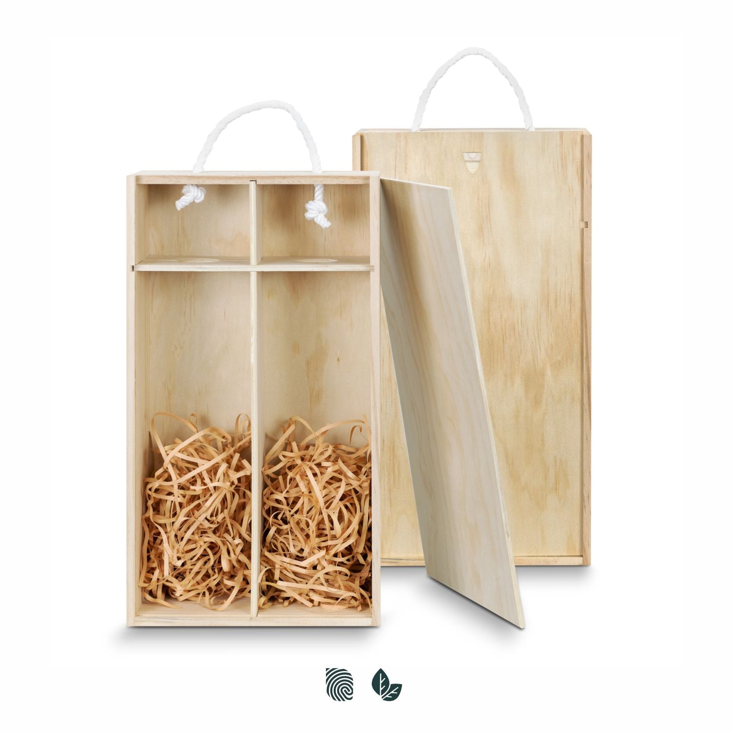 Stylish display of graphic t-shirts on wooden wall with decorative plates and abstract art.