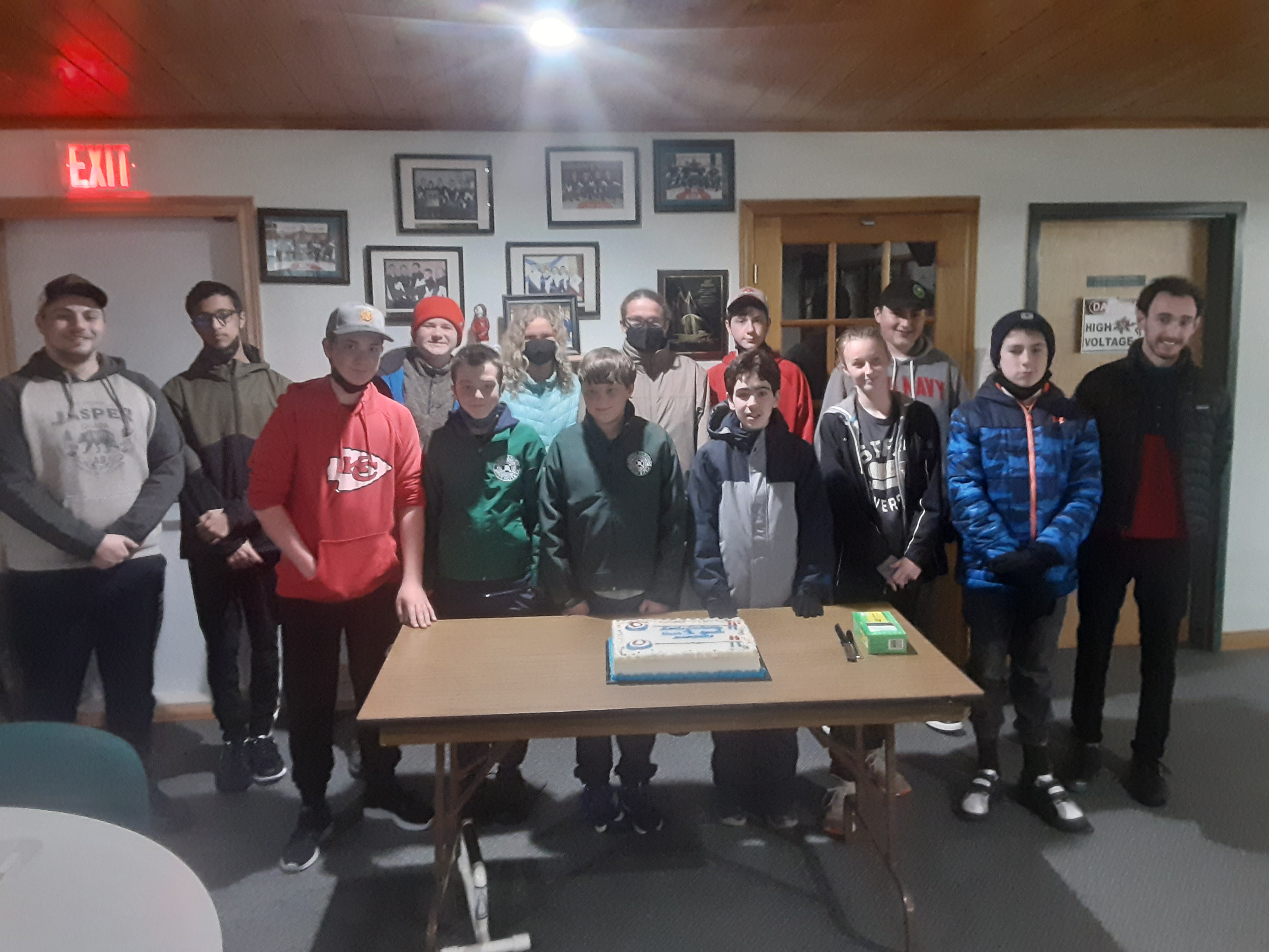 Junior Curlers celebrating their final night with some cake :)