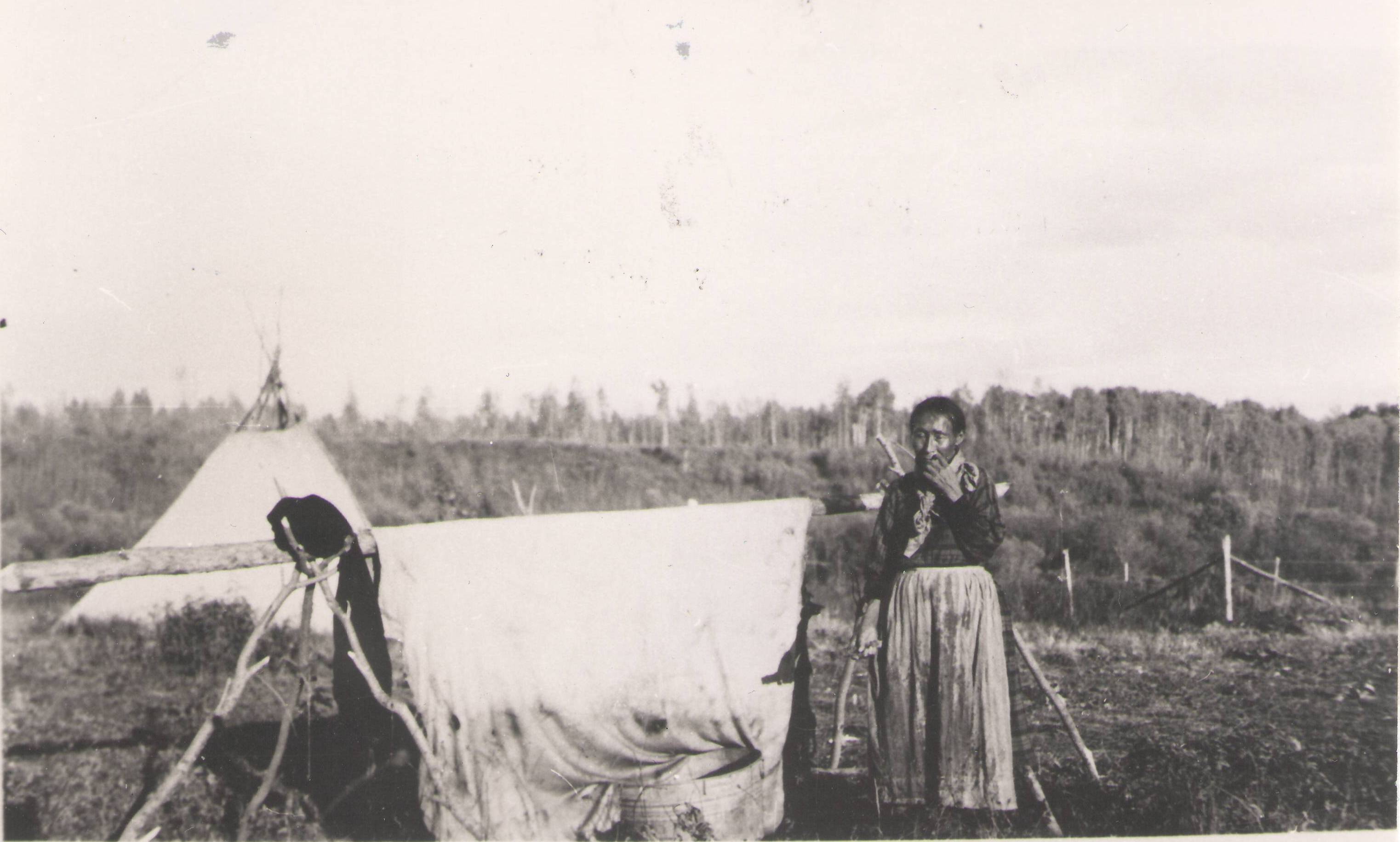 This Lady from Upper Hay River is tanning a moose hide. If you look close you can see she holds a scraping tool in her right hand. The picture is dated 1936. Let us know if you recognize this person!
990.4.79.214 / Reid Gordon