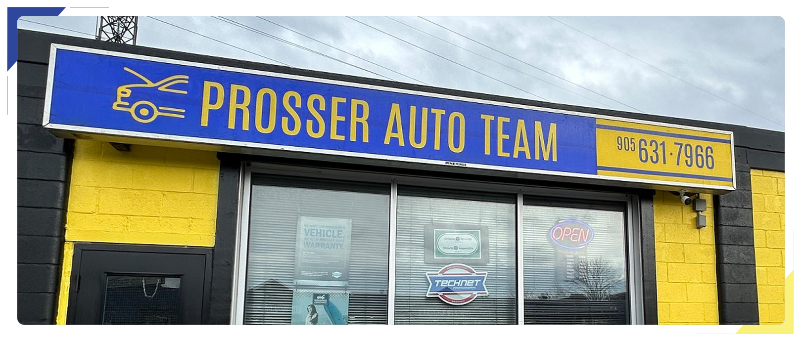 A yellow building, which is the business store front