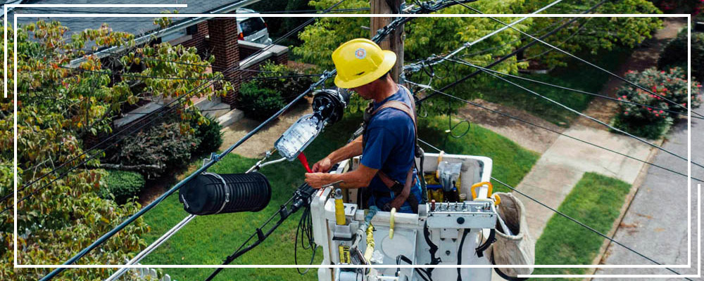 A man working on an electrical power line