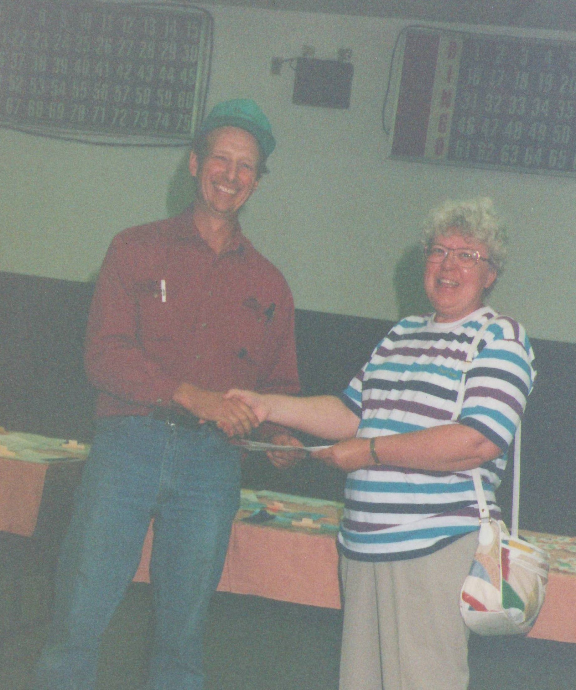 This photo is from the 1996 fall fair and in it we have John Simpson on the left handing over an award to someone labelled as "Rocky Lane Bench Show Fair contestant". It is likely they were the master exhibitor that year and are being presented with a cheque of their winnings - does anyone know who they are?
2018.08.762 / Cranna Toews, Marilee
This is Eunice Johnson