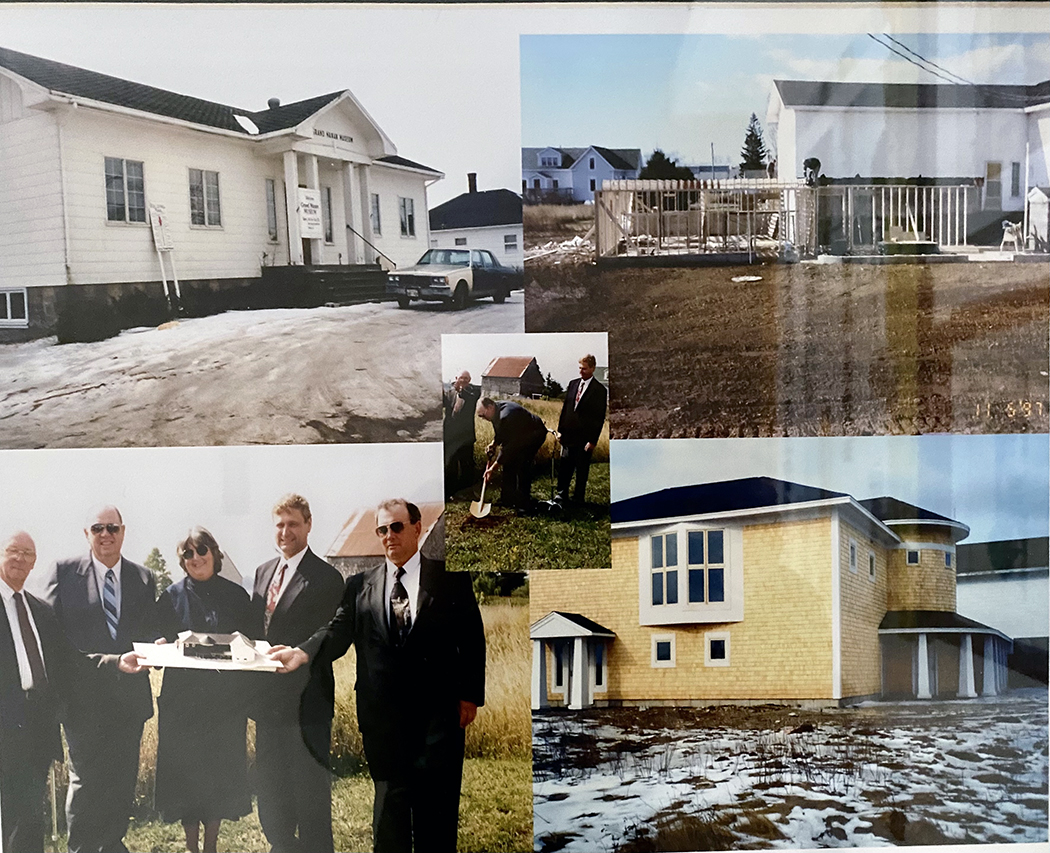 The major expansion in 1997 showing board members holding the architect's model