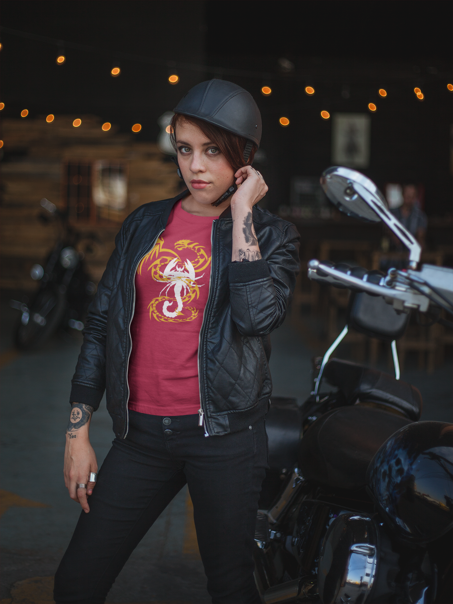 https://0901.nccdn.net/4_2/000/000/04d/add/of-a-tattooed-biker-woman-wearing-a-t-shirt-adjusting-her-half-s.png