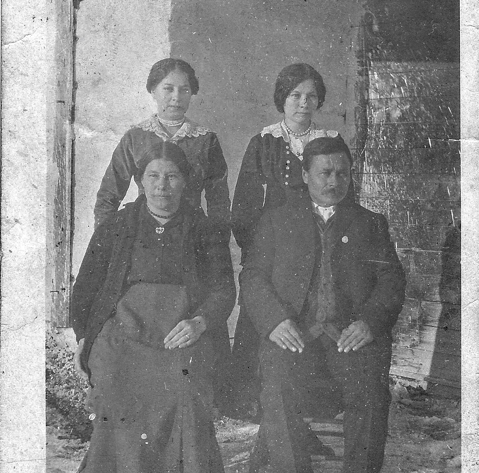 We believe this photo is a family shot of Parents and their two daughters. Let us know if you have any further information on who these people might be!
2019.24.109 / Lizotte, Maria

**EDIT**
This is Jean Laferte and wife Christine (Lizotte) with Daughters Louisa (left) and Mary Jane!
