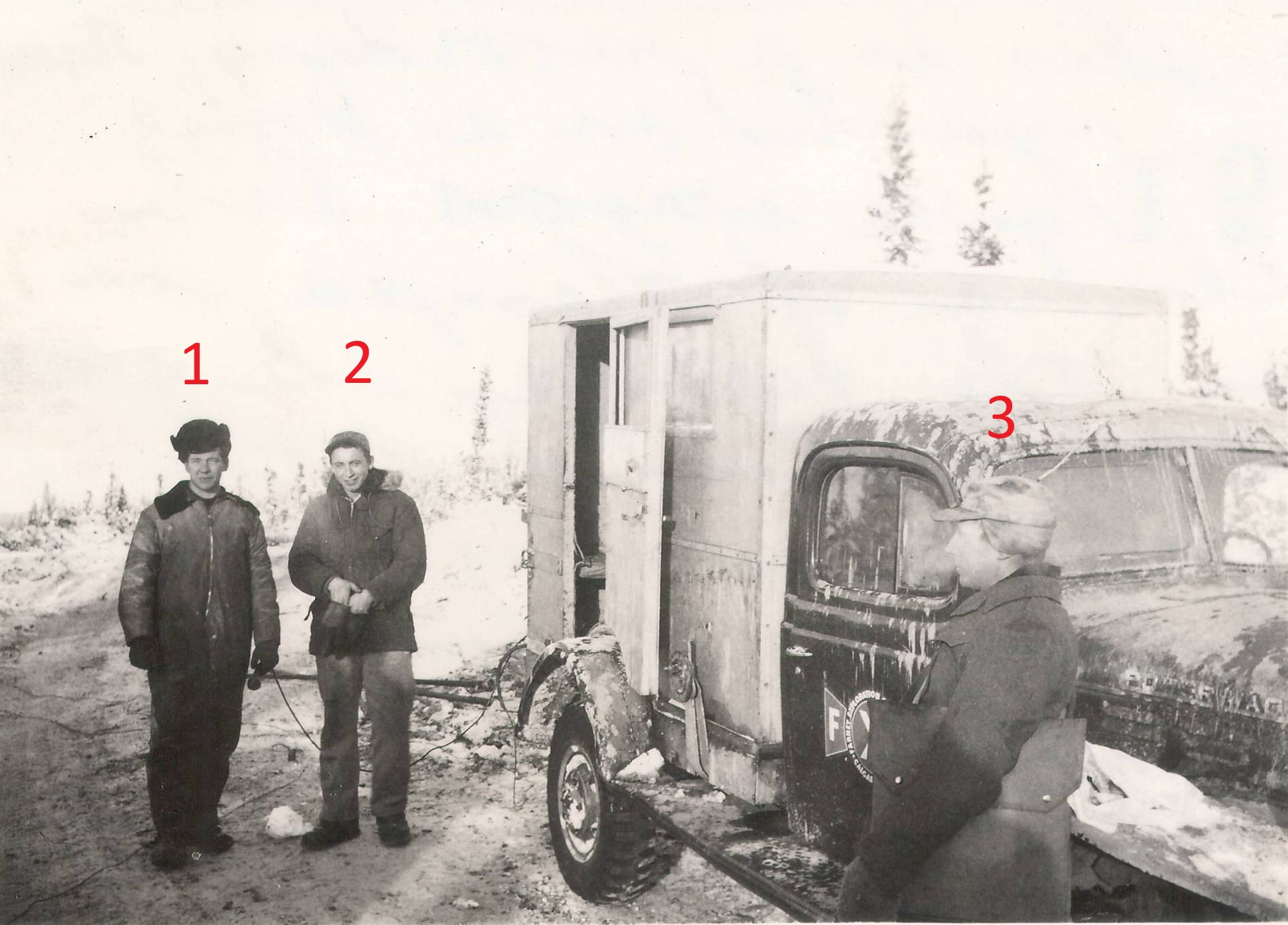 The description on this photo states "Recording truck mounted on a Dodge Power Wagon. Pete Slundra of Nampa is in the Centre (#2). The research crew consisted of the operator, shooter, shooter's helper and four jug-hustlers." 
We know this crew is doing seismic work in the Buffalo Head hills in the 1950's - but if you have any insight regarding who the other individuals are - or the noted job titles - please let us know! 
990.4.108.10 / Watson, Mick
