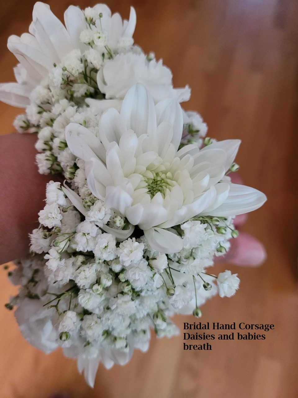 Bridal hand corsage Daisies $20 each 