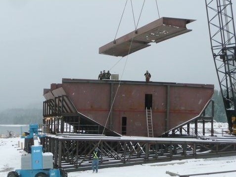 Port sponson installation.  The cantilever formed part of the car deck allowing for more deck space while still having an efficient narrow hull.