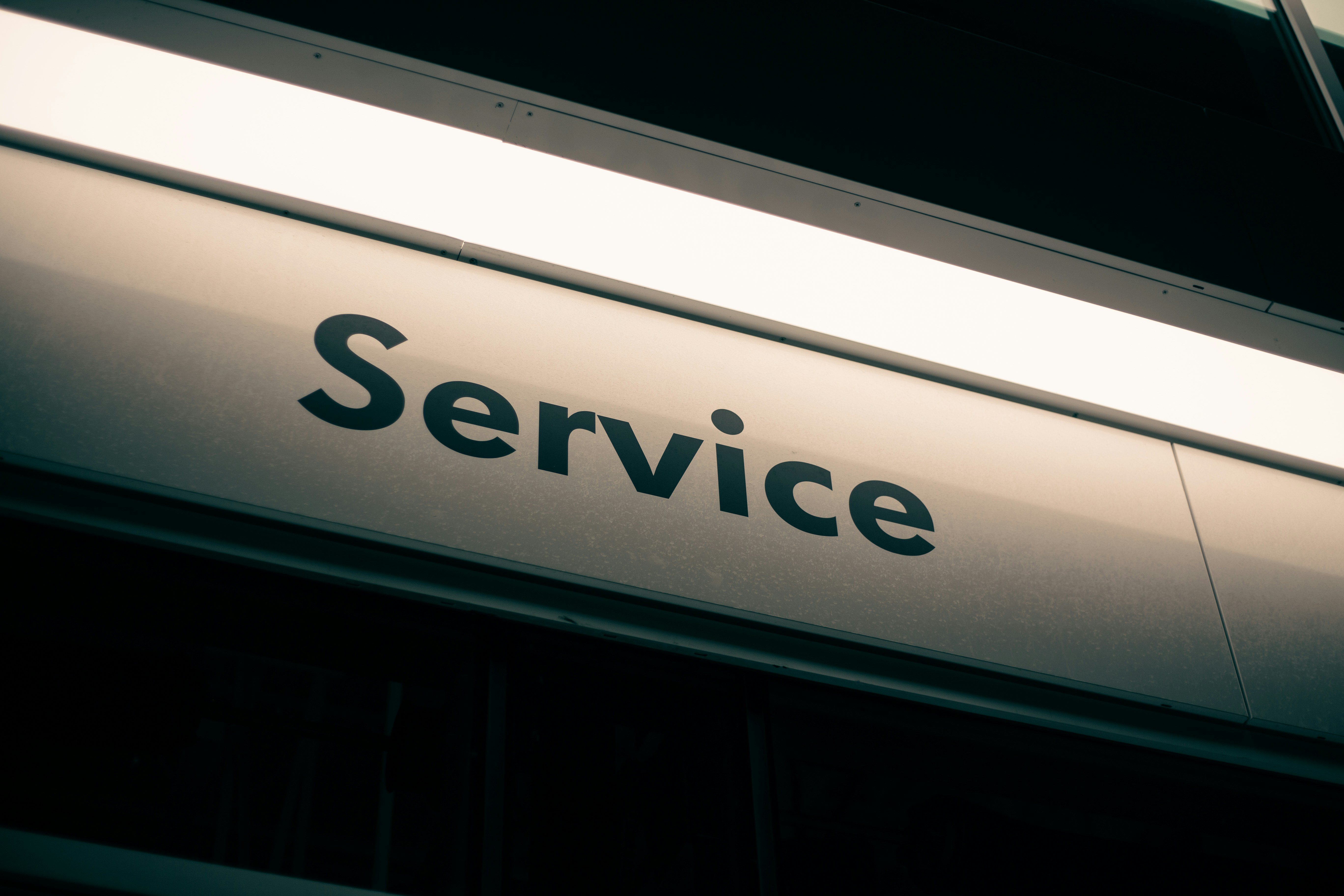 Illuminated service sign on public transport vehicle.