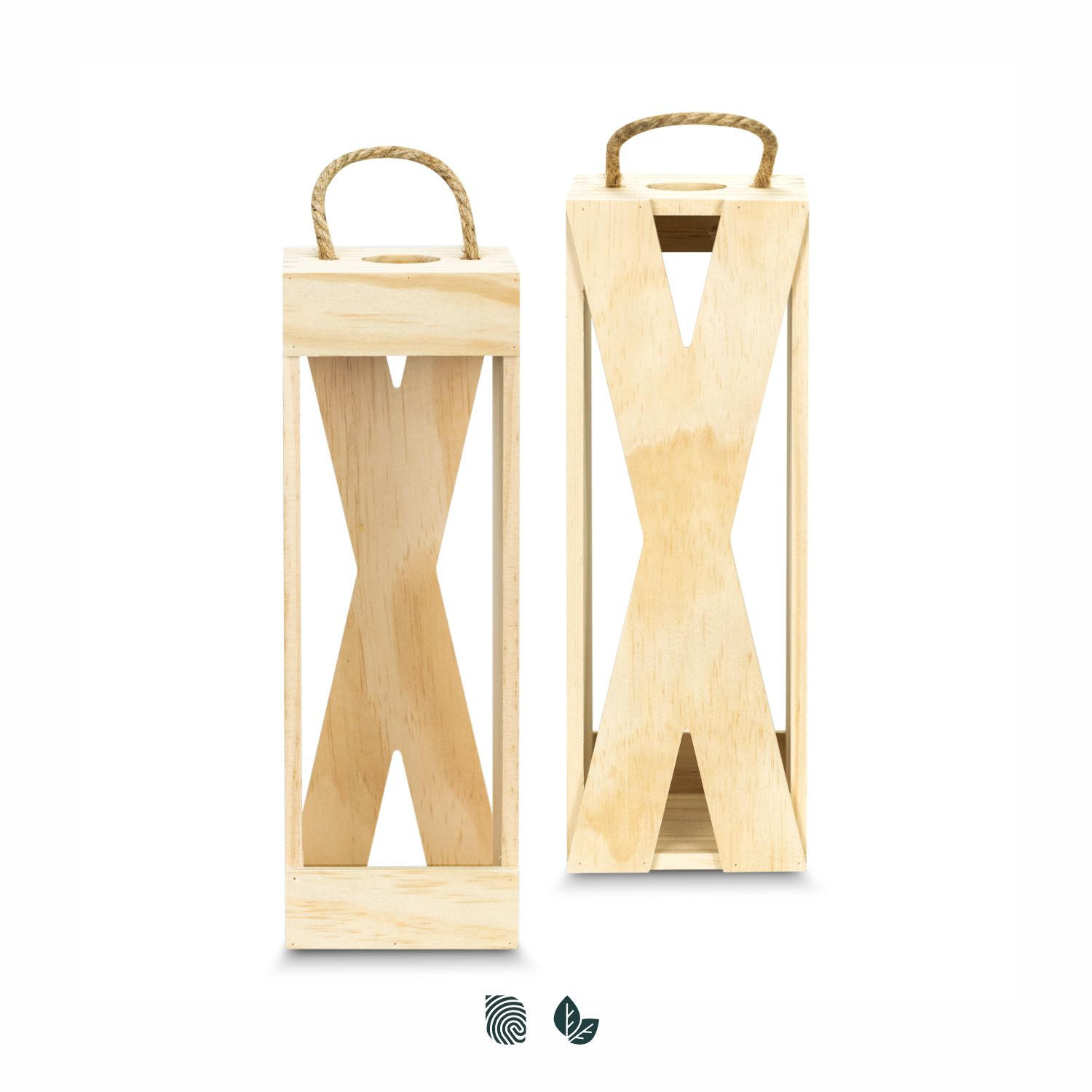 Smiling barista in blue shirt standing with arms crossed in a cozy coffee shop with shelves stocked with jars and bottles.