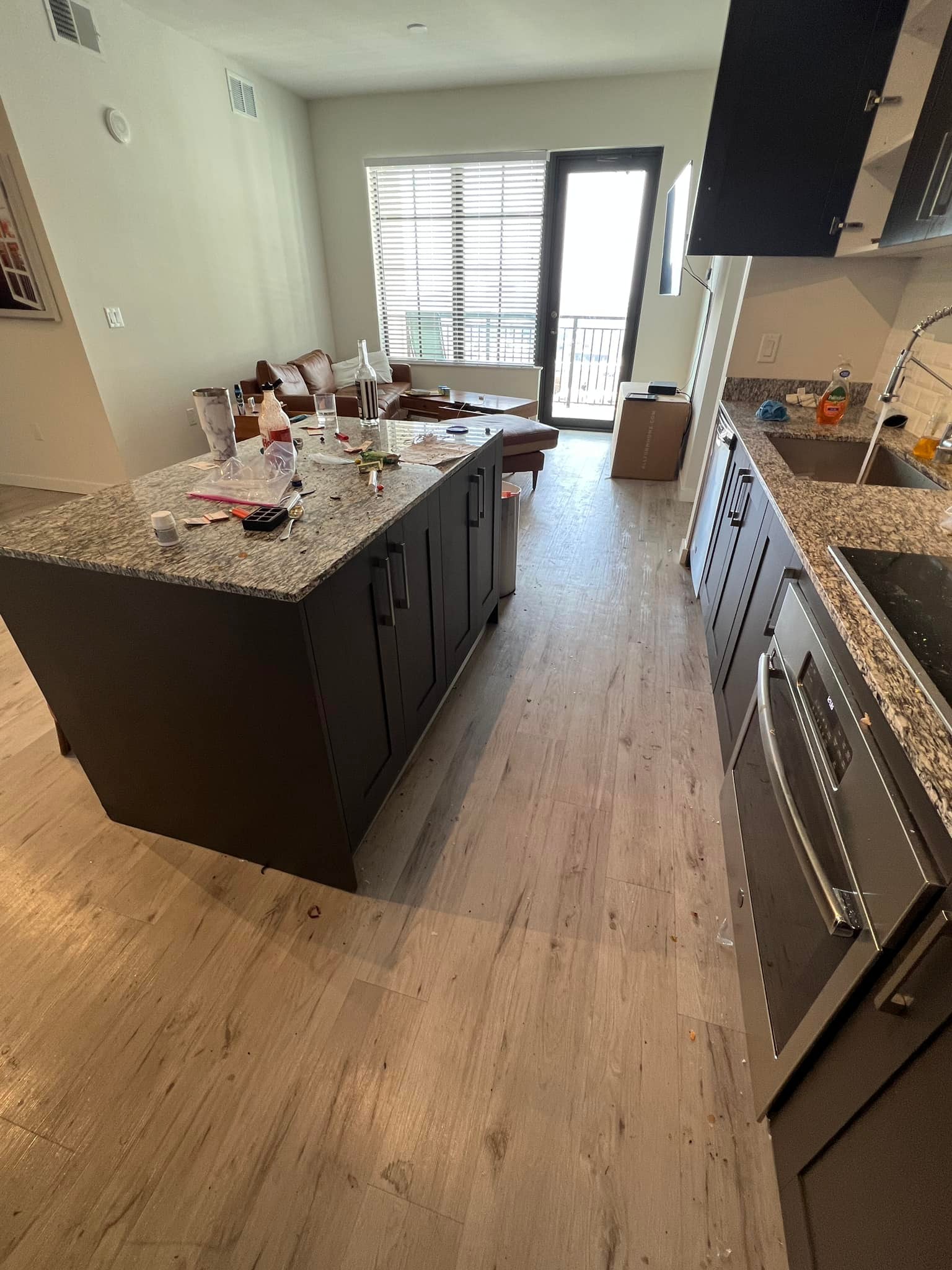 Deep cleaning Toronto – modern condo kitchen before Deep Clean Reset with cluttered counters and active living conditions