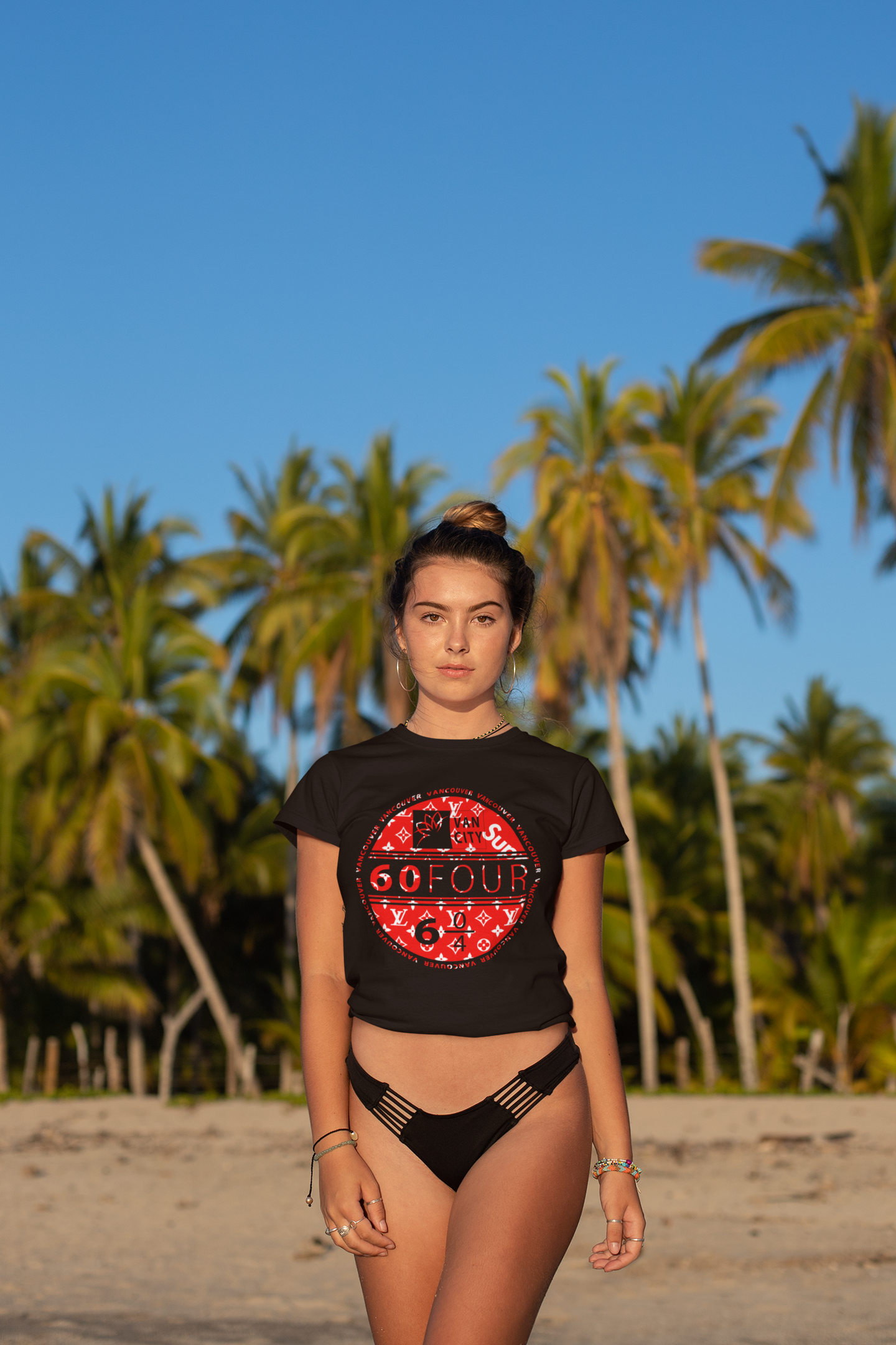 https://0901.nccdn.net/4_2/000/000/056/7dc/604-tee-of-a-bronzed-woman-by-some-palm-trees-at-the-beach-gosex.png