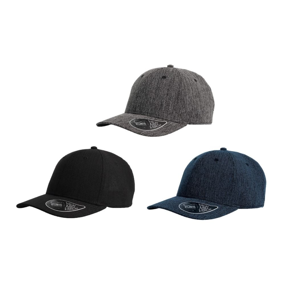 a person sitting on a wooden floor in front of a neon sign