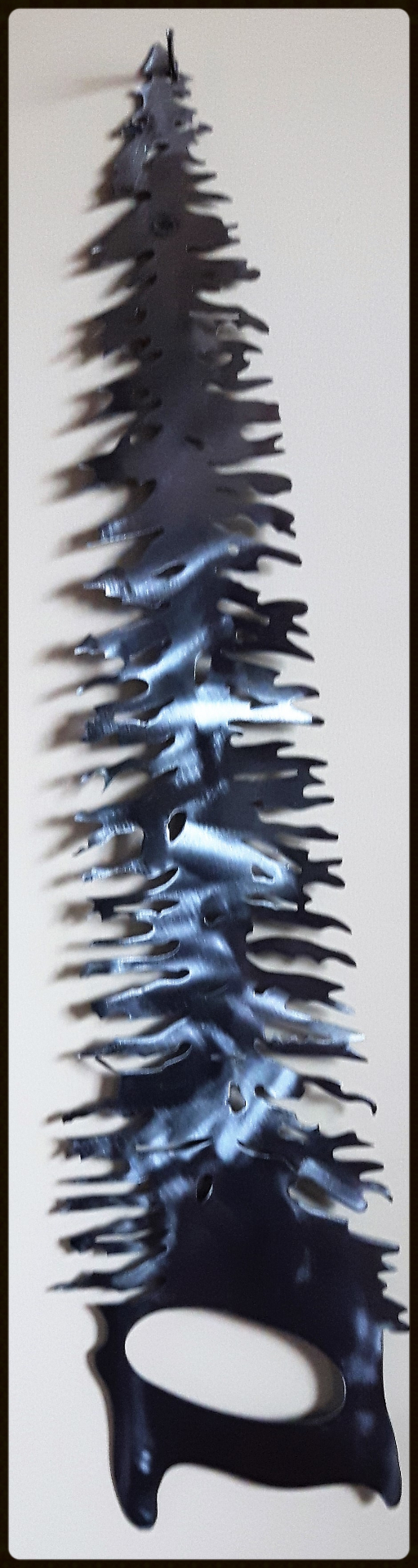 Metal Art, Tree handsaw, Campbell river BC, Vancouver island BC, Vancouver BC, Victoria BC, British Columbia,Alberta