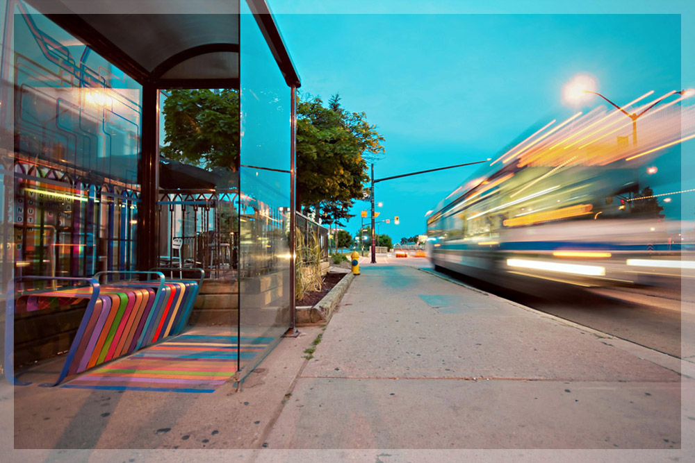 A blurry image of a bus driving by