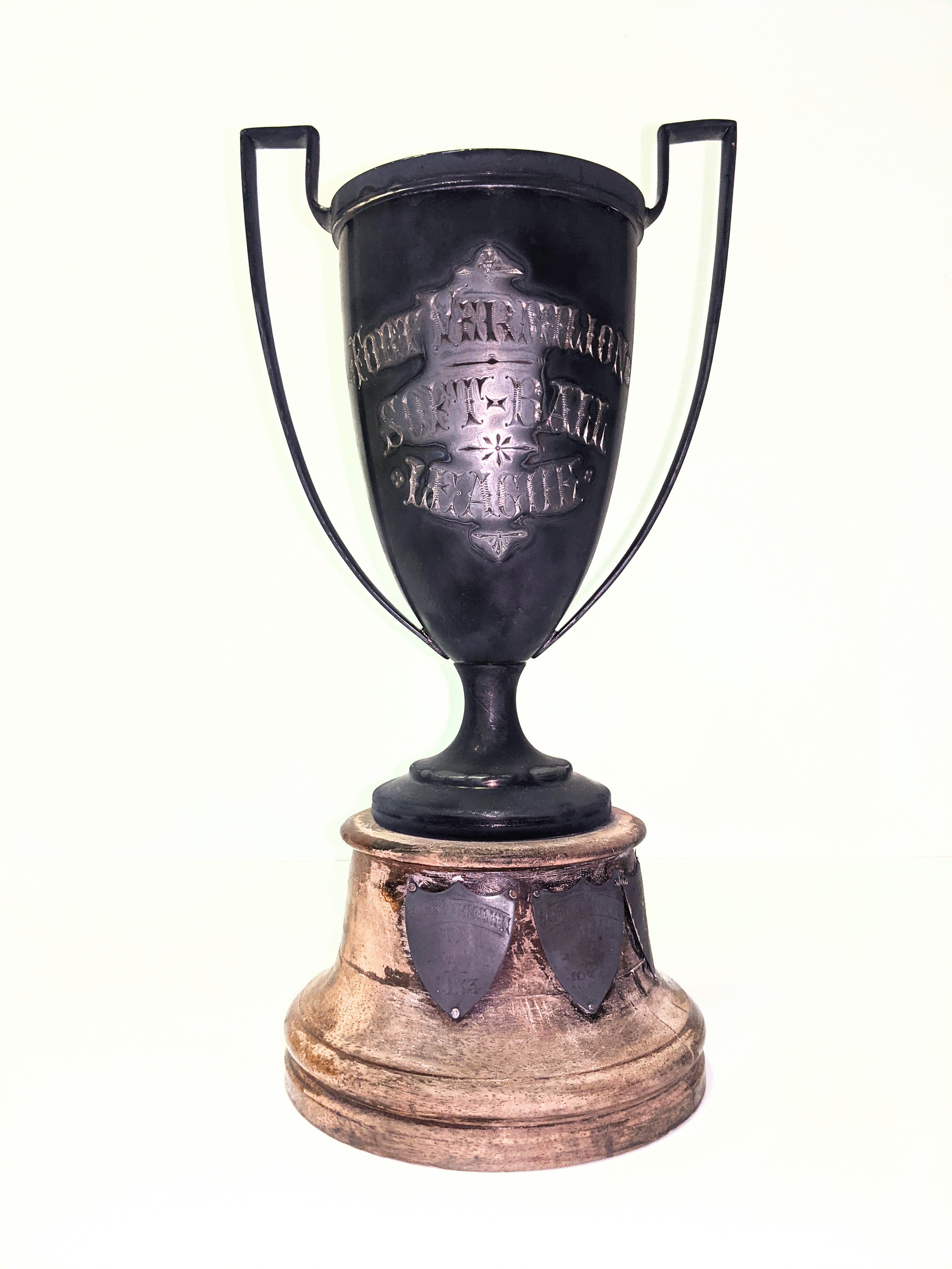 This is a sterling silver trophy (that badly needs polishing) for the "Fort Vermilion Soft Ball League". The 3 crests at the bottom detail "Fort Vermilion Softball Club" as champions in 1933 and "Stoney Point Softball Club" as champions in 1934 + 1935. The original price of the trophy is noted on the bottom as $15.25

15/02/2021
2000.18.09 / Jones, Art
