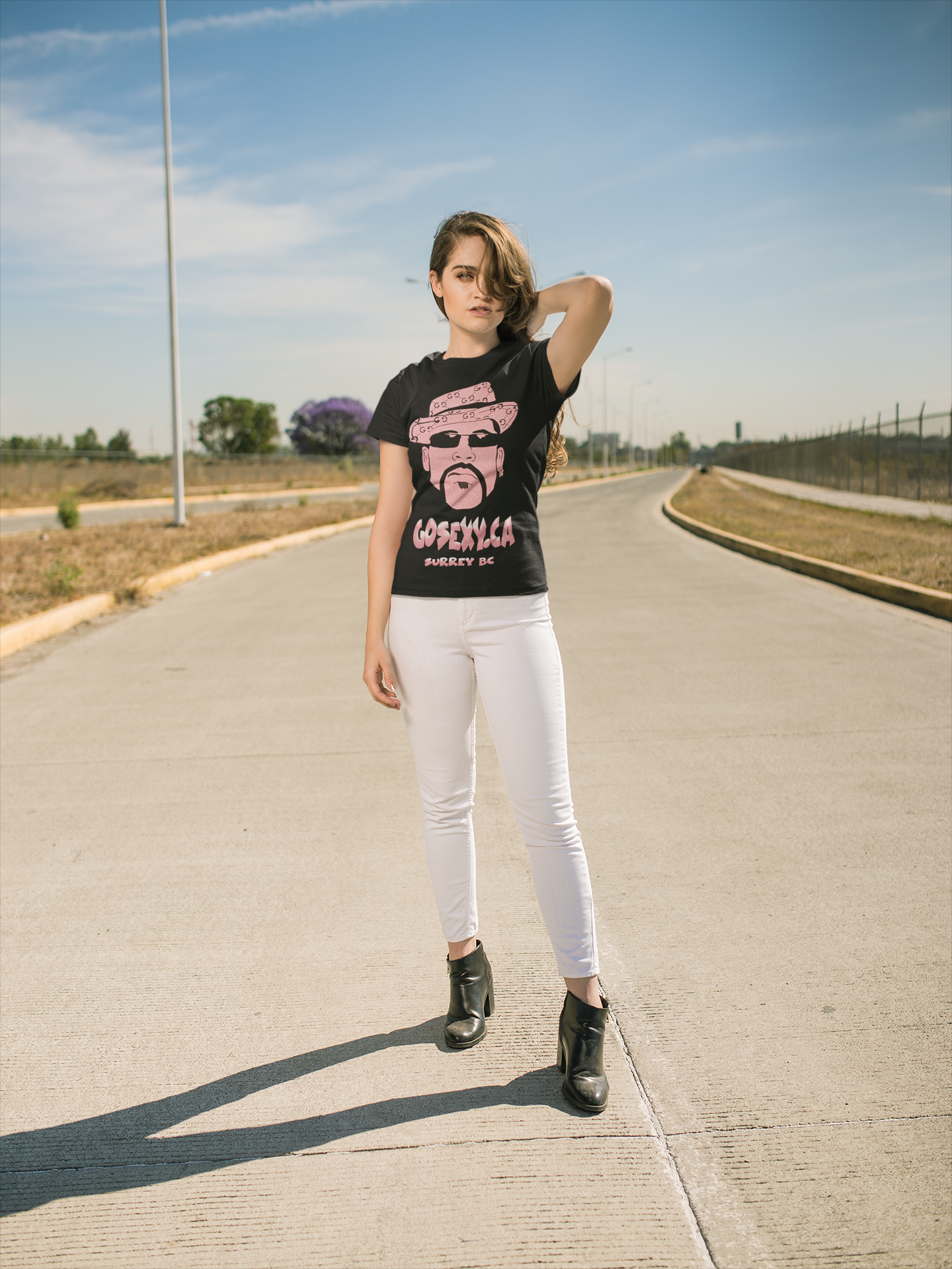 https://0901.nccdn.net/4_2/000/000/05c/c64/of-a-woman-in-white-jeans-and-a-tshirt-posing-on-an-empty-road-g.png