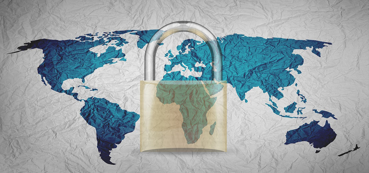 A lock overlaying a map of the world