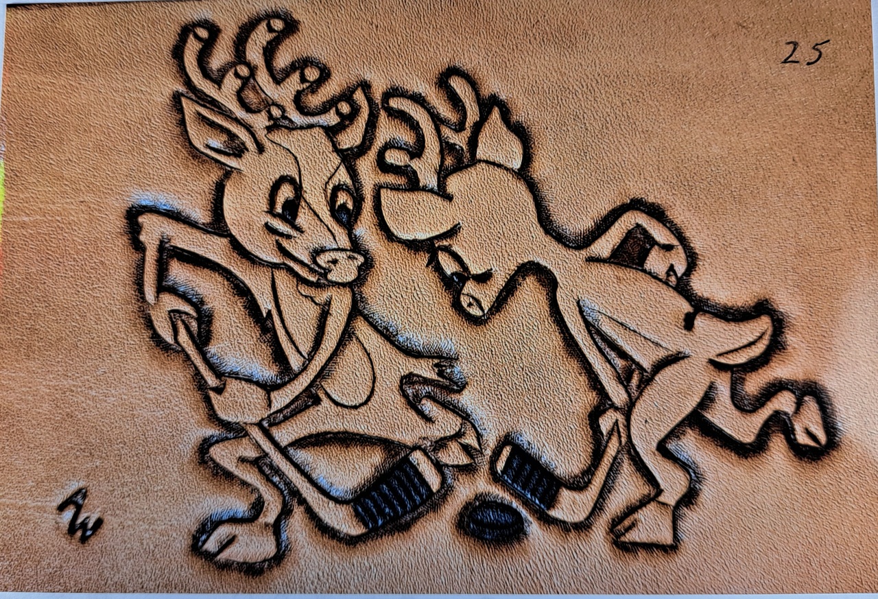 Custom leather work detailing two deer playing hockey
