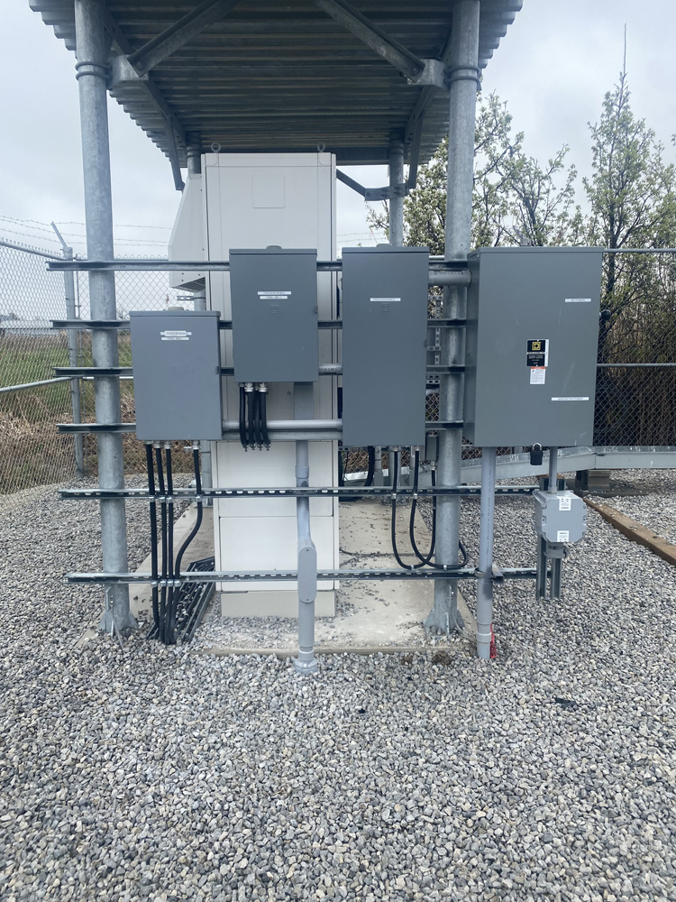 Several electrical boxes outside