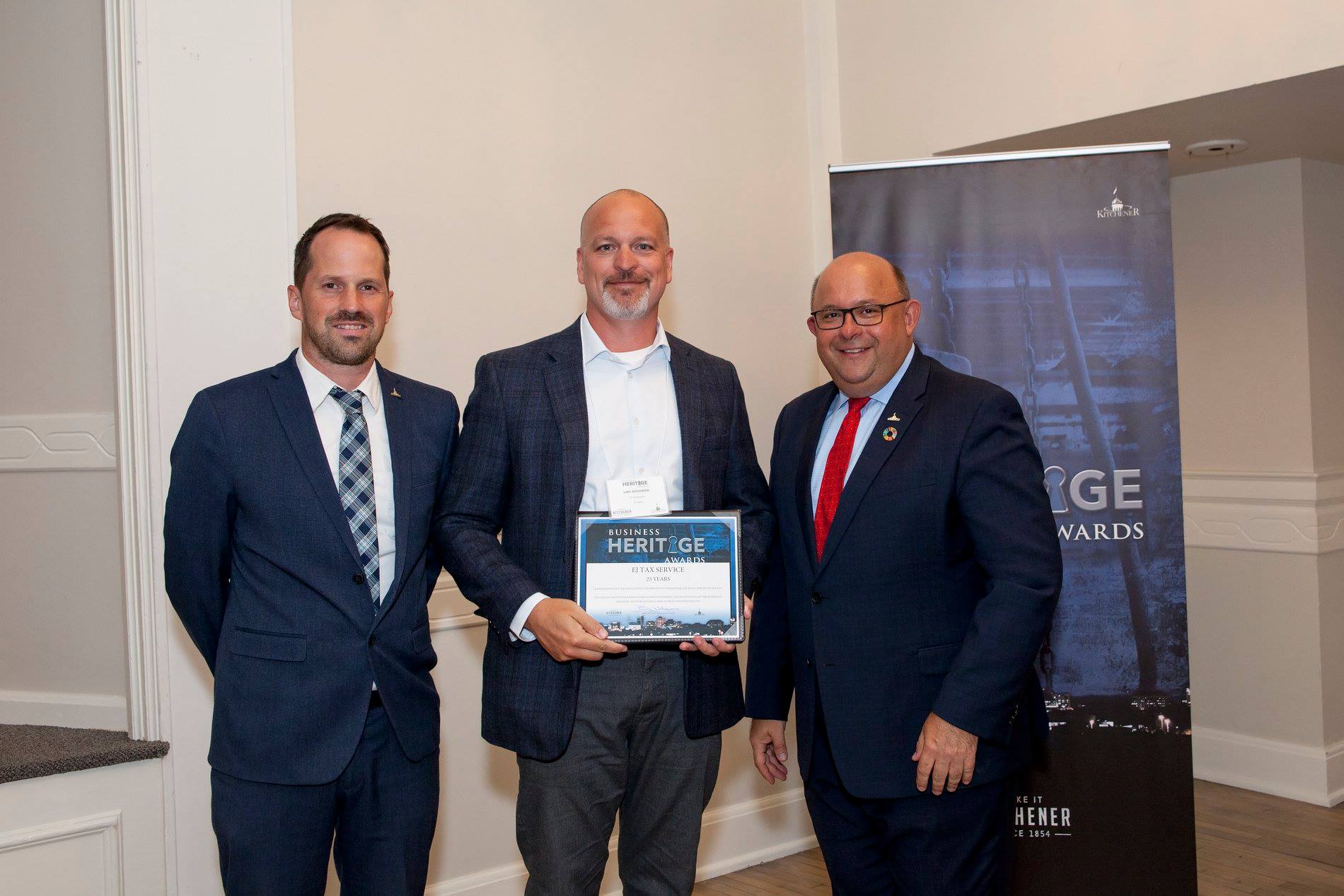 Modern tax service office reception area with plants, wooden accents, and lighting, featuring 'EJ Tax Service' signage.
Modern tax service office reception area with plants, wooden accents, and lighting, featuring 'EJ Tax Service' signage.
