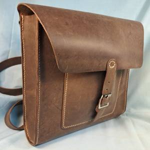 Custom brown leather bag with buckle