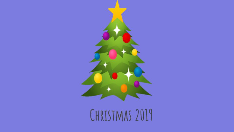 Decorated Christmas Tree with ornaments and white lights on a blue background for the Christmas 2019 concert highlights