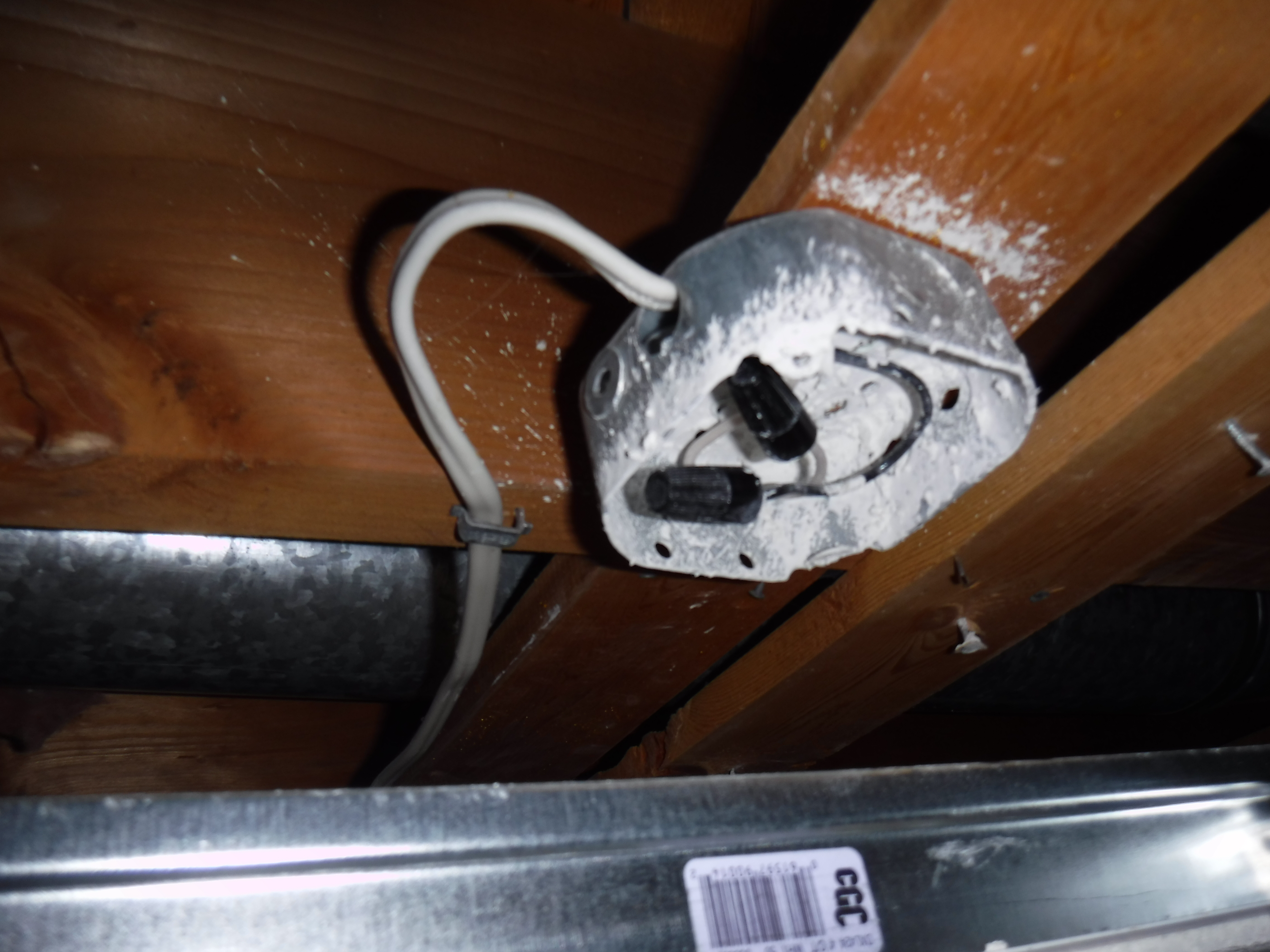Uncovered Junction Box in Ceiling
