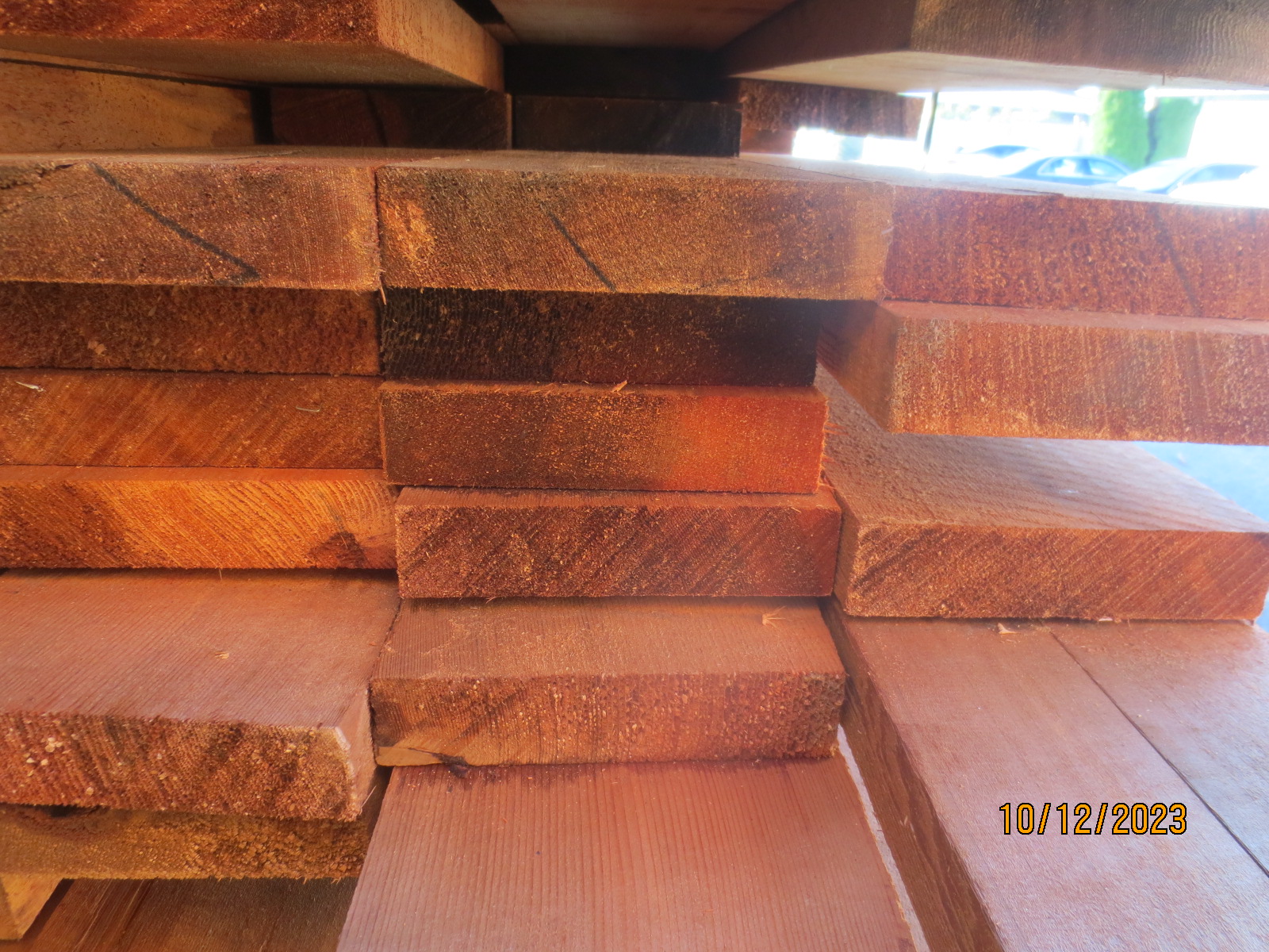 stack of brown wooden logs