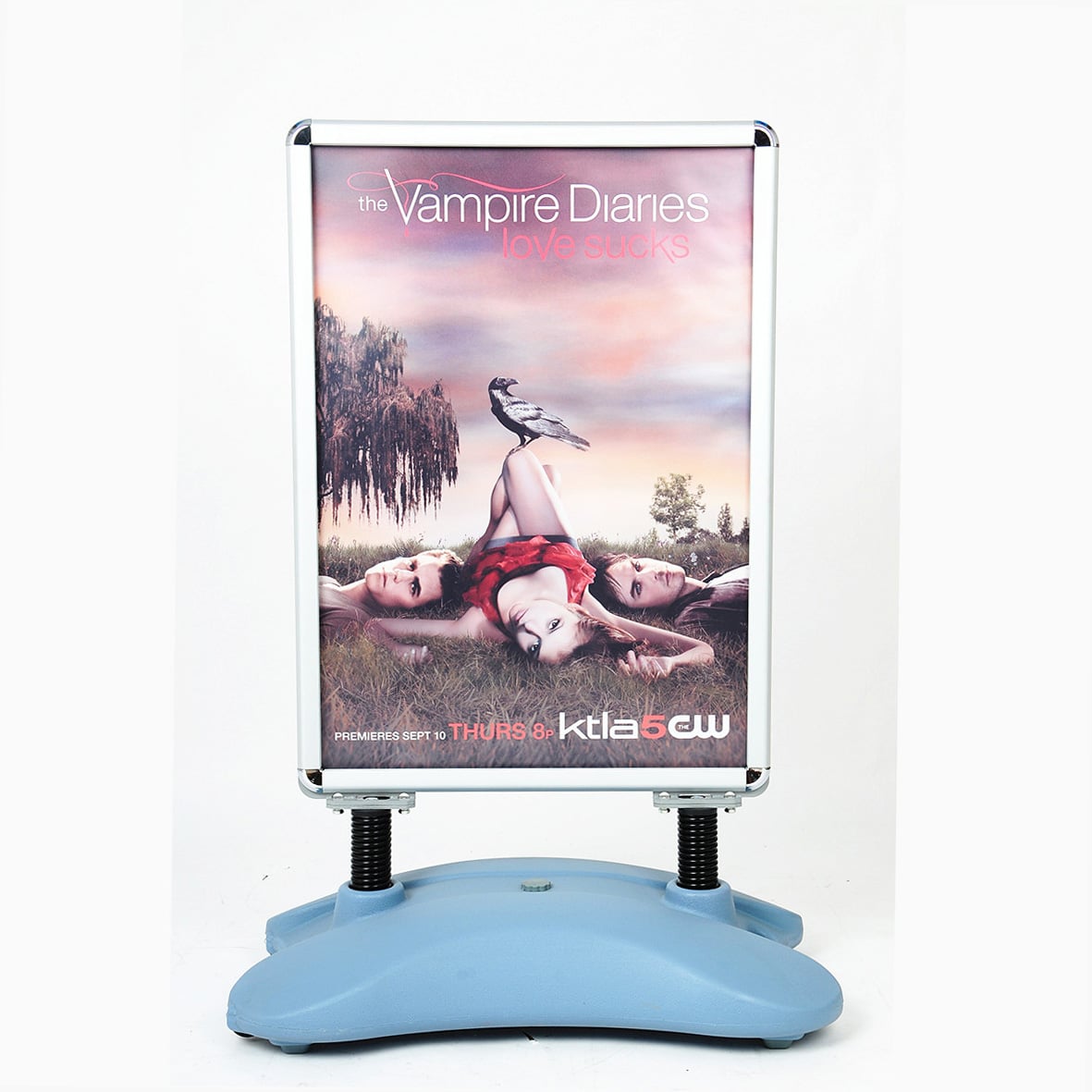 a red building with a clock on the side of it